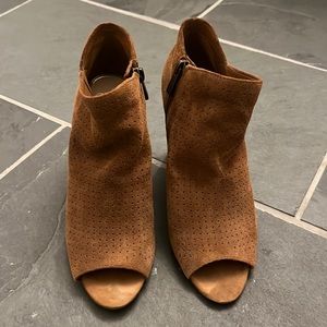 Jessica Simpson heeled, open toe booties.